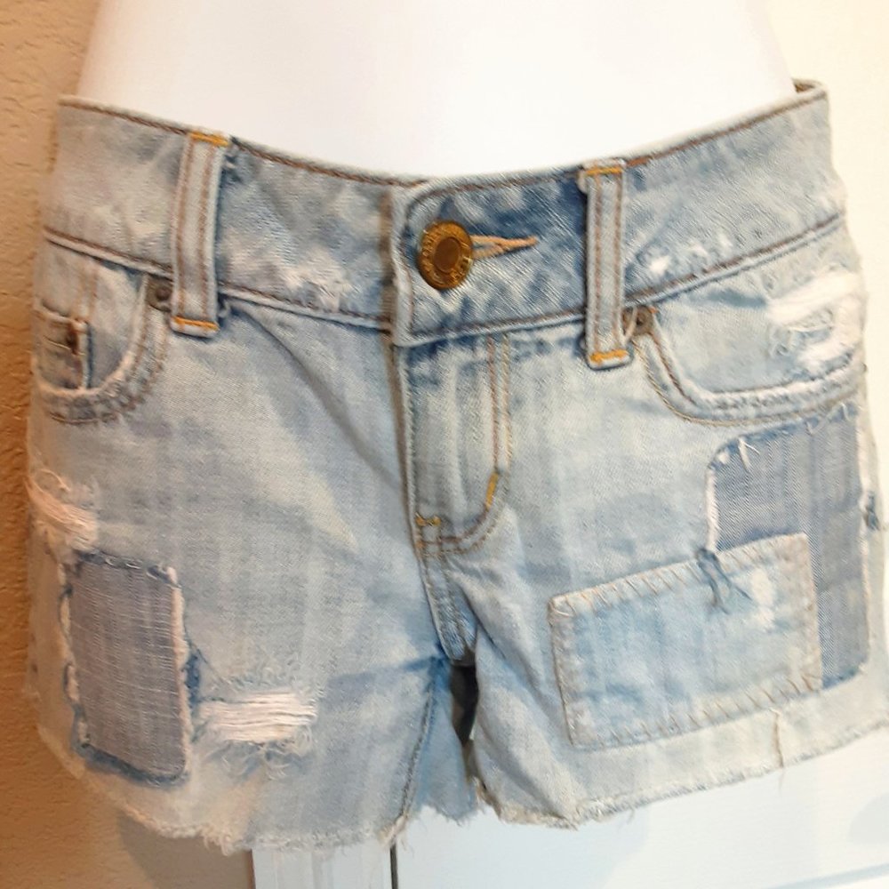 REALLY Awesome distressed patched denim shorts  from American Eagle